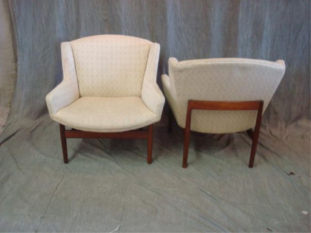 Appraisal: Pair of Midcentury Danish modern chairs upholstered with teak frames