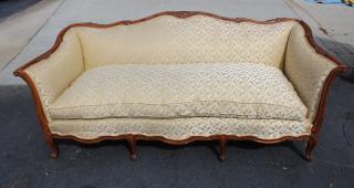 Appraisal: Louis XV style carved walnut upholstered sofa h x l