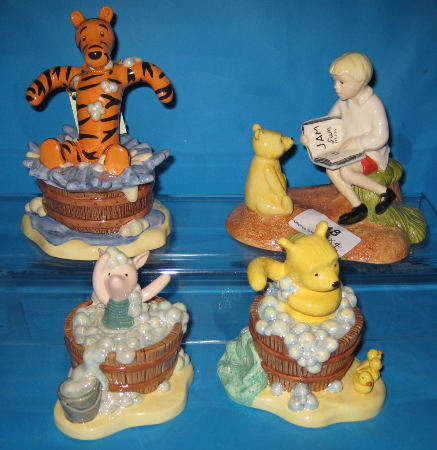 Appraisal: Royal Doulton Winnie the Pooh Figures A Clean Bear is