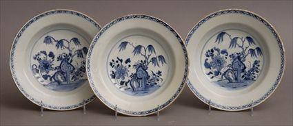 Appraisal: THREE CHINESE BLUE AND WHITE PORCELAIN SOUP PLATES The x-banded