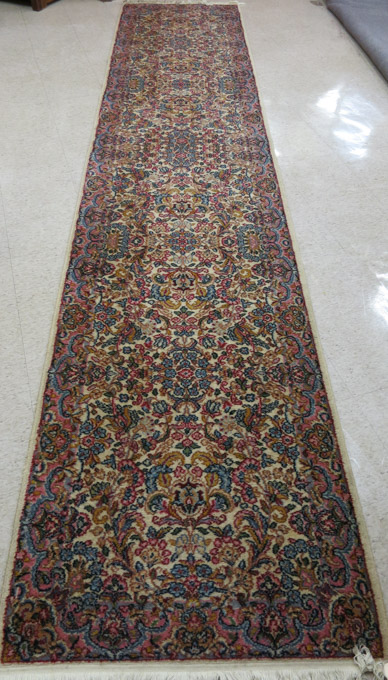 Appraisal: A KARASTAN AMERICAN ORIENTAL RUNNER Kerman pattern machine loomed Karastan