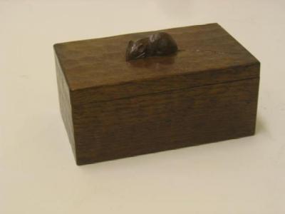 Appraisal: AN ADZED OAK BOX by Robert Mouseman Thompson of oblong