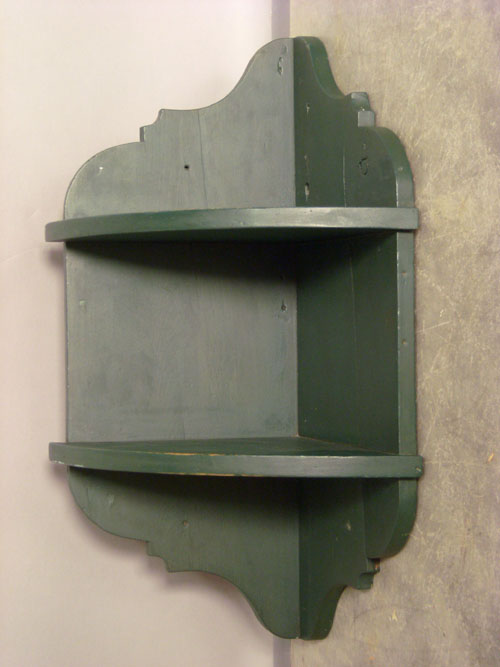 Appraisal: Painted green corner wall shelf Provenance Collection of Richard and