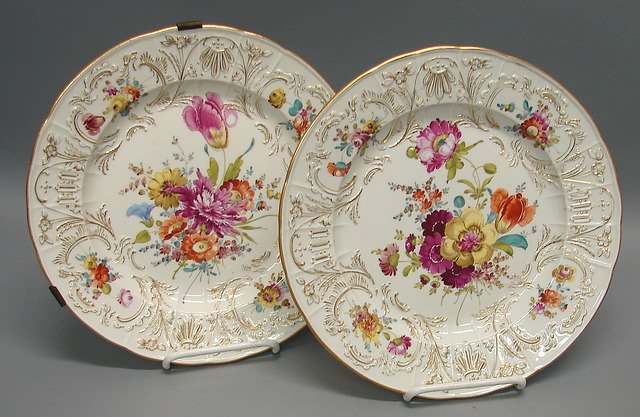 Appraisal: Center with multicolored flowers shell bordered reserves gilt trim underglaze