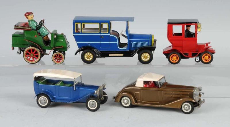 Appraisal: Lot of Tin Old-Timer Car Friction Toys Description Japanese Condition