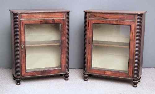 Appraisal: A pair of George IV rosewood pier cabinets inlaid with