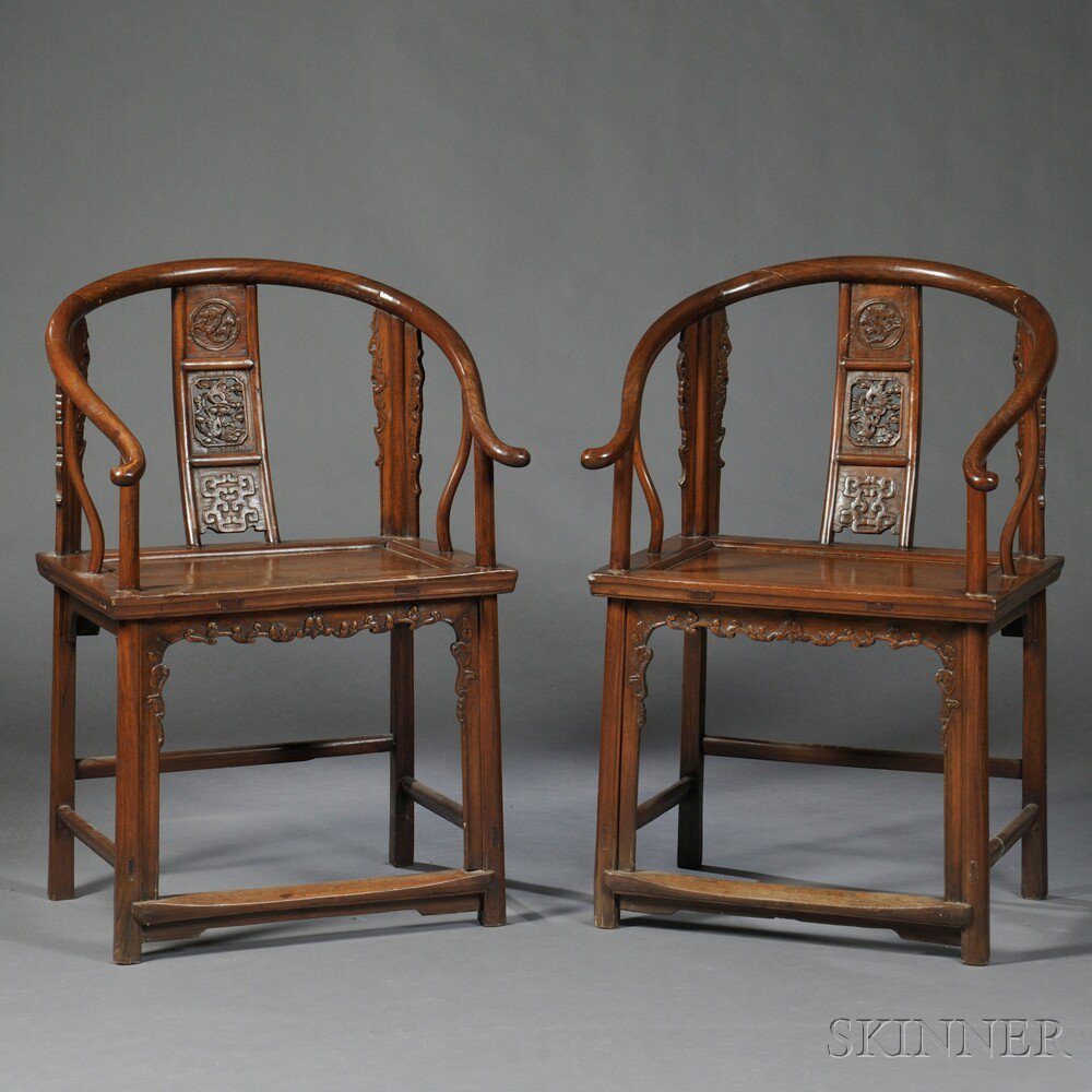 Appraisal: Pair of Horseshoe-back Armchairs China th th century yumu splat