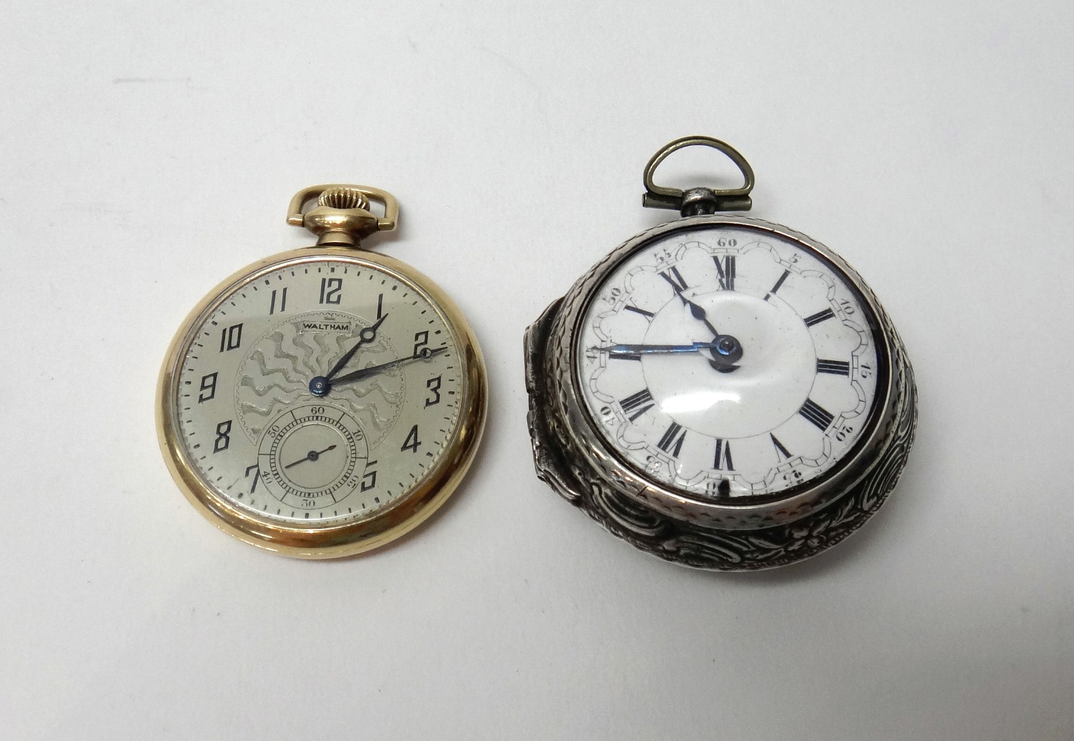 Appraisal: A silver twin cased openfaced pocket watch the gilt fusee