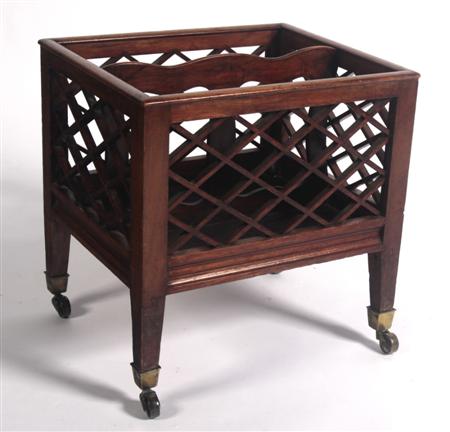 Appraisal: A th century mahogany altered Canterbury with two lattice work