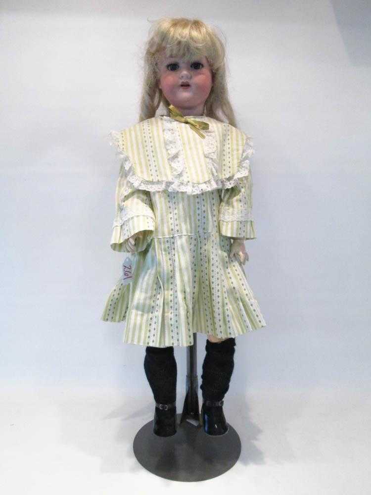 Appraisal: ARMAND MARSEILLE BISQUE SOCKET HEAD DOLL with blond wig bisque