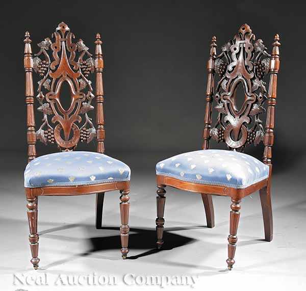 Appraisal: A Pair of American Gothic Carved Walnut Hall Chairs mid-