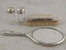 Appraisal: A silver hand mirror silverclothes brush and two silver topped