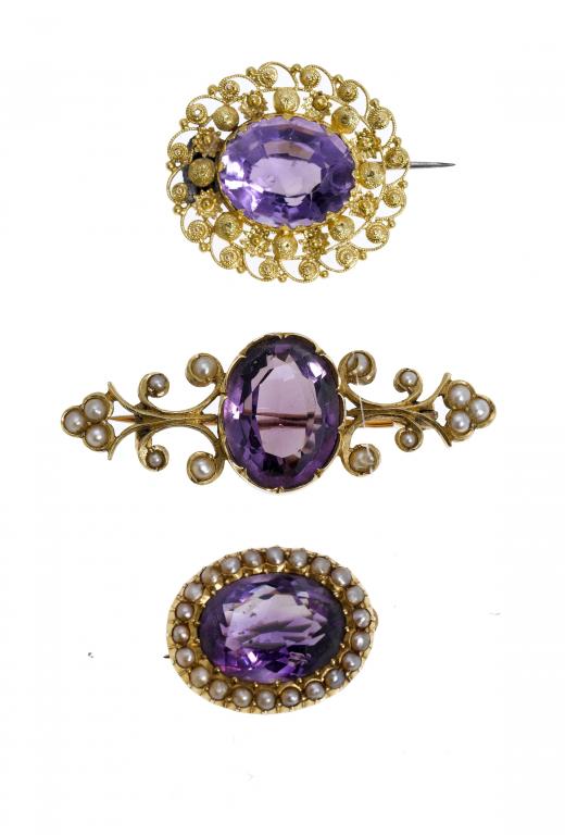 Appraisal: AN AMETHYST AND CANNETILLE BROOCH AND TWO AMETHYST AND SPLIT