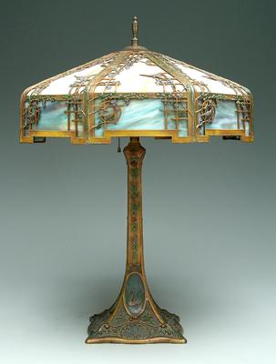 Appraisal: Stained glass Tiffany style lamp openwork cast metal frame with