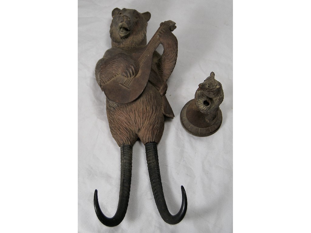 Appraisal: A th century Black Forest carved wood hanging coat hook