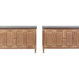 Appraisal: A Pair of Reed-Carved Marble-Top Console Cabinets in the Style