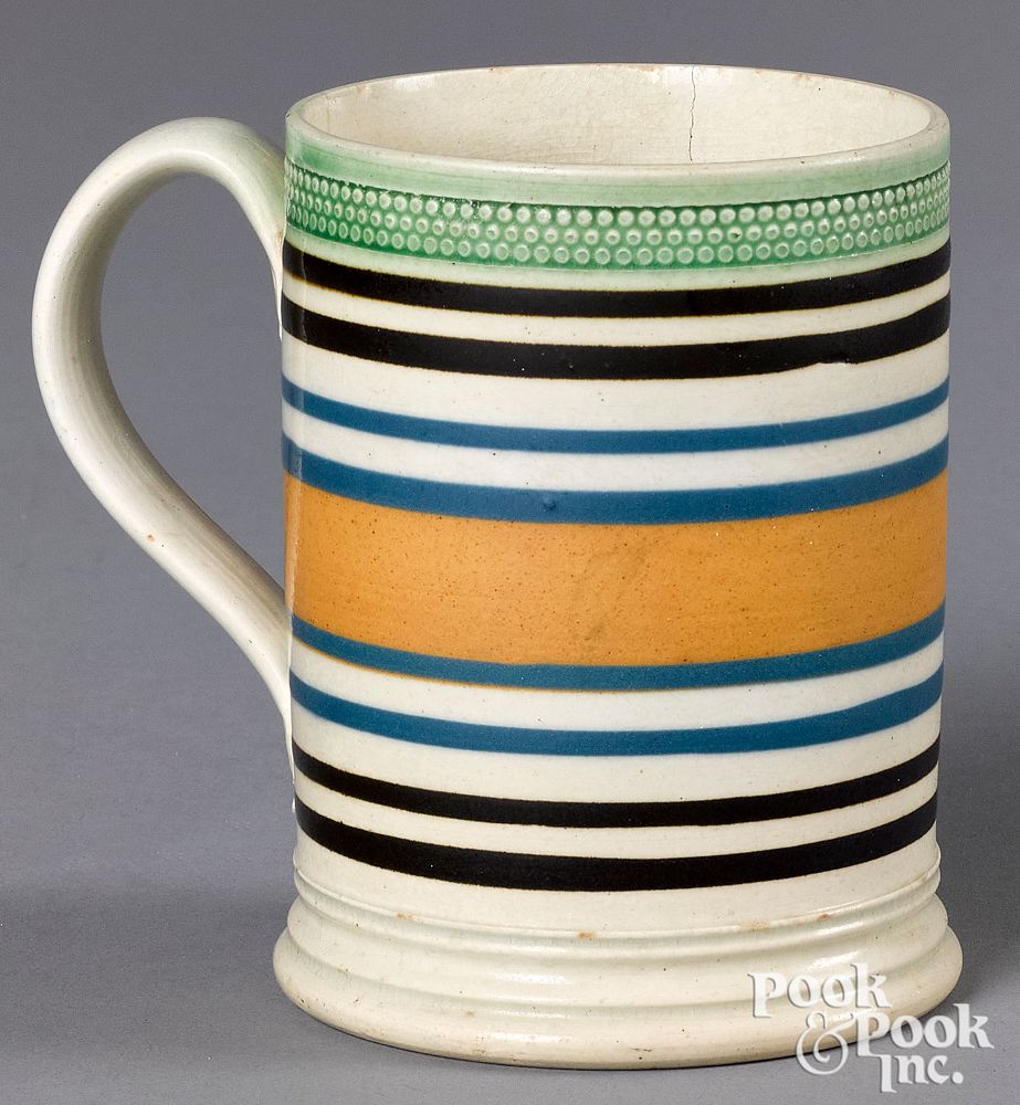 Appraisal: Mocha mug with brown blue and tan bands Mocha mug