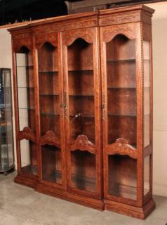 Appraisal: FRENCH PROVINCIAL STYLE CARVED OAK BOOKCASE FRENCH PROVINCIAL STYLE CARVED