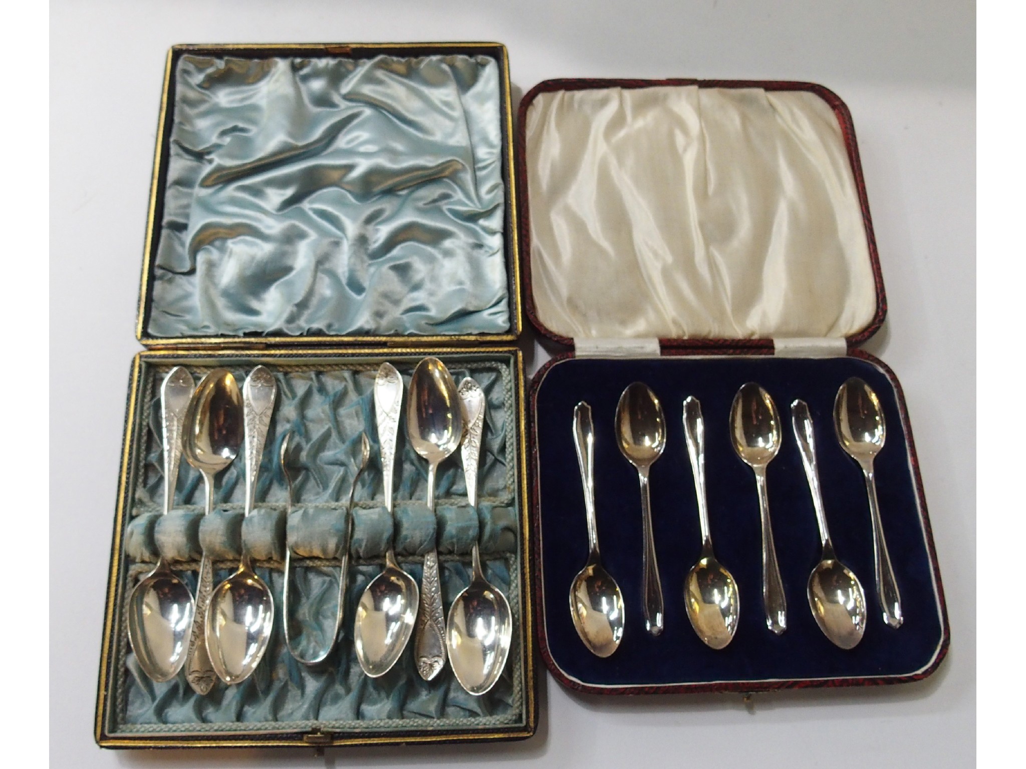 Appraisal: A lot comprising two cased sets of six silver coffee