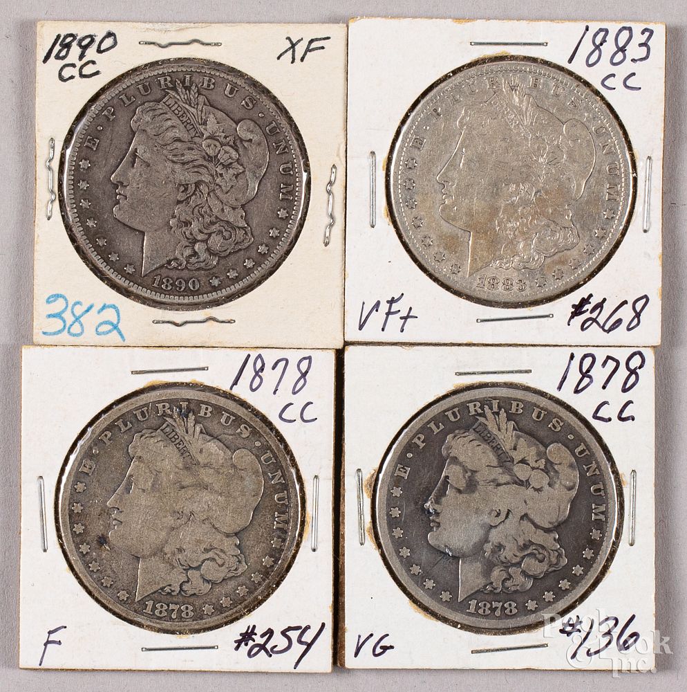 Appraisal: Four Carson City Morgan silver dollars Four Carson City Morgan