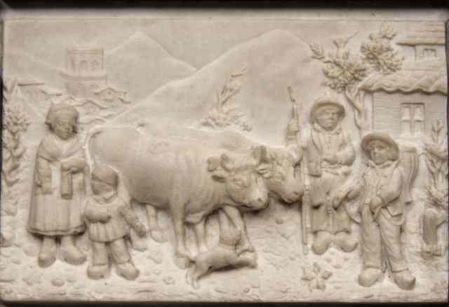 Appraisal: A SMALL LIMESTONE PLAQUE depicting country folk and cattle x