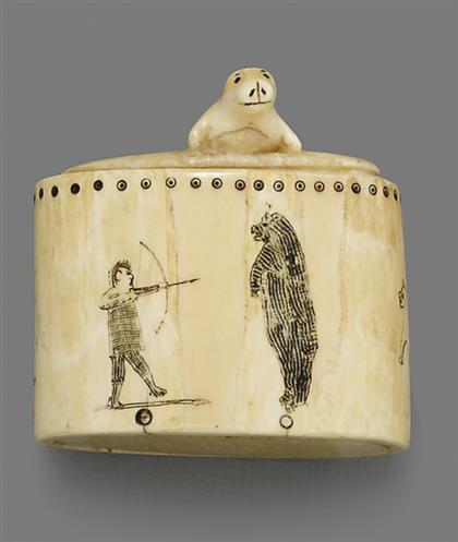 Appraisal: Inuit carved walrus ivory boxOf oval form the lid with