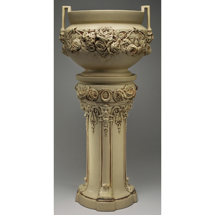 Appraisal: Weller jaudiniere and pedestal handled form with roses and faces