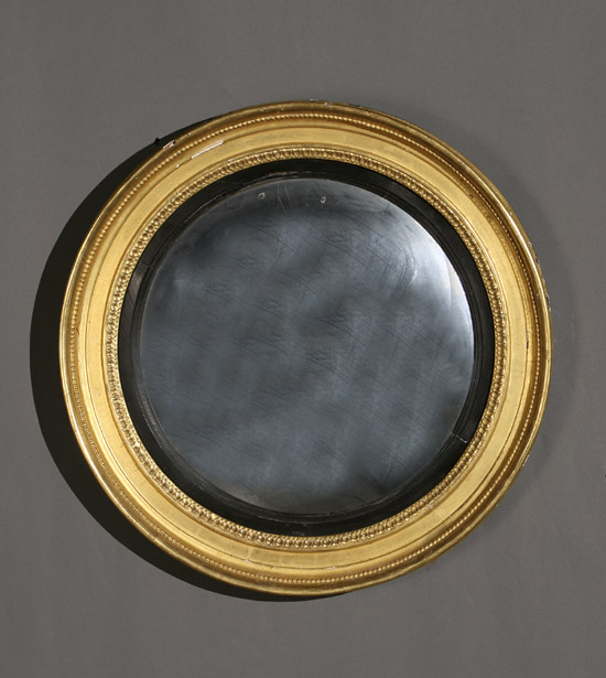 Appraisal: Regency Parcel Ebonized Giltwood Convex Mirror Early th Century Regilded