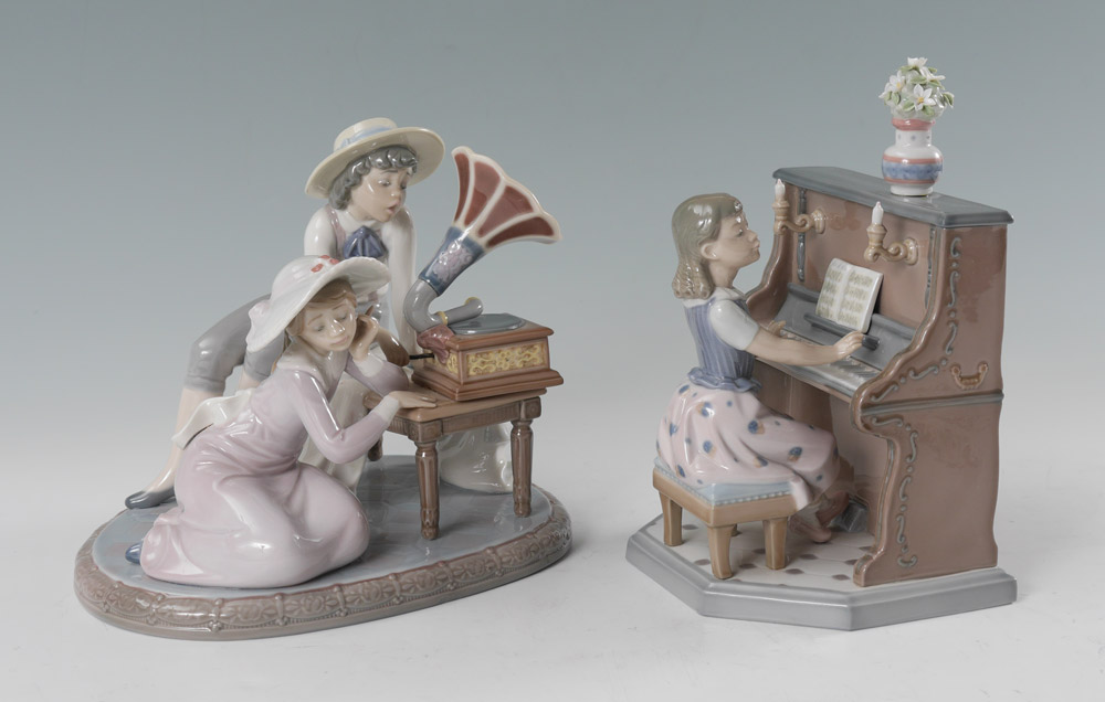 Appraisal: TWO LLADRO PORCELAIN MUSICAL FIGURINES To include MUSIC TIME Regino