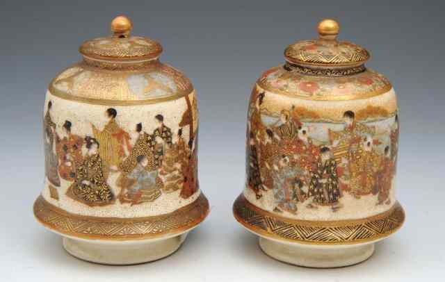 Appraisal: A PAIR OF SMALL JAPANESE SATSUMA VASES and covers each