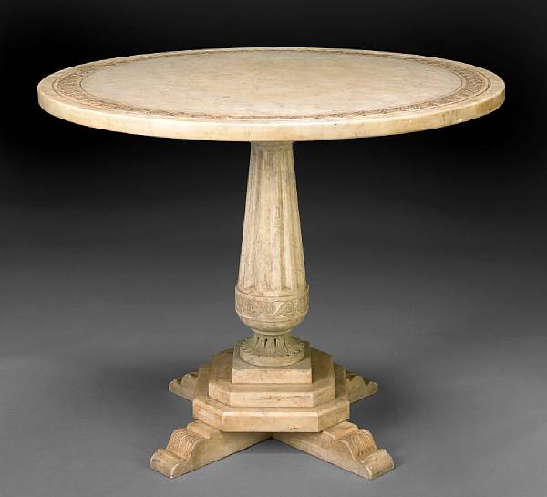 Appraisal: A Neoclassical style marble table The circular top with carved