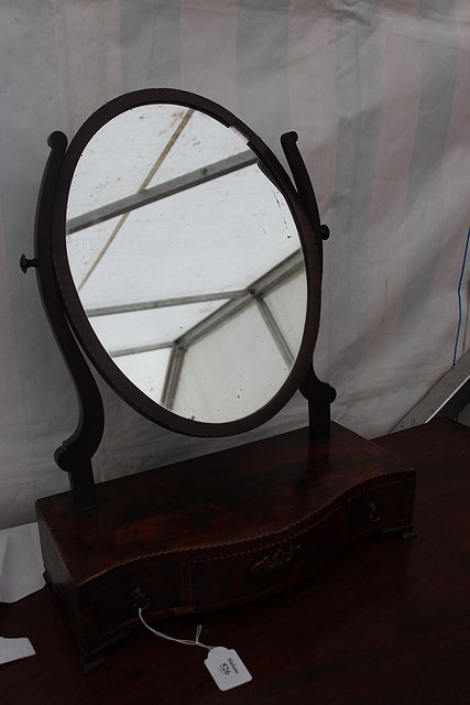 Appraisal: A GEORGE THE RD SERPENTINE FRONTED MAHOGANY BOX TOILET MIRROR