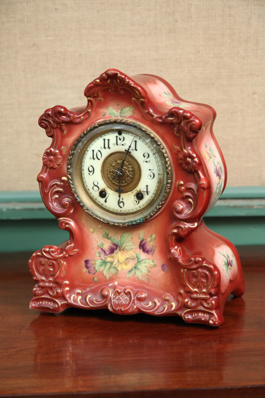 Appraisal: WATERBURY CHINA MANTLE CLOCK Eight day time strike with brass