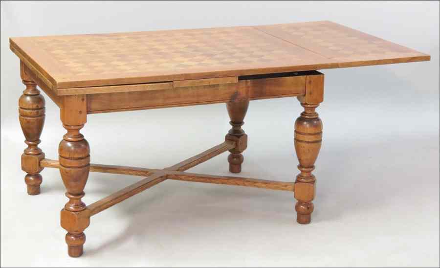 Appraisal: OAK DRAW LEAF TABLE With checker surface and raised on