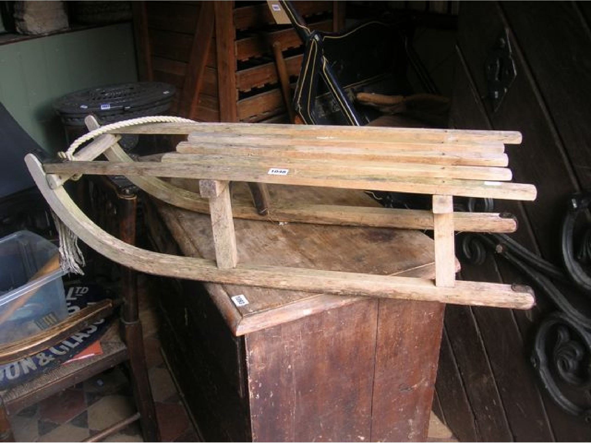 Appraisal: A wooden toboggan sledge with slatted seat