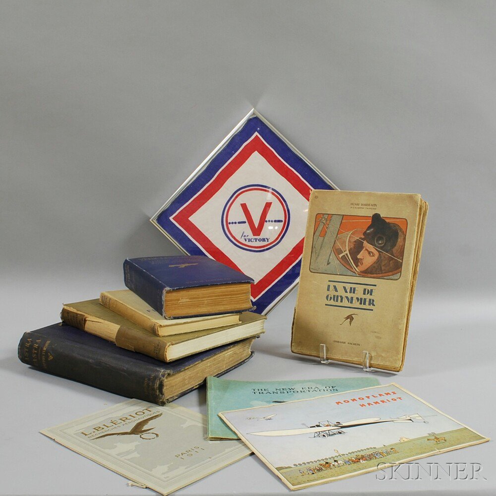 Appraisal: Eight Books and Catalogs on Aviation and a Framed Handkerchief