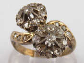 Appraisal: A yellow metal tests carat gold old cut diamond crossover