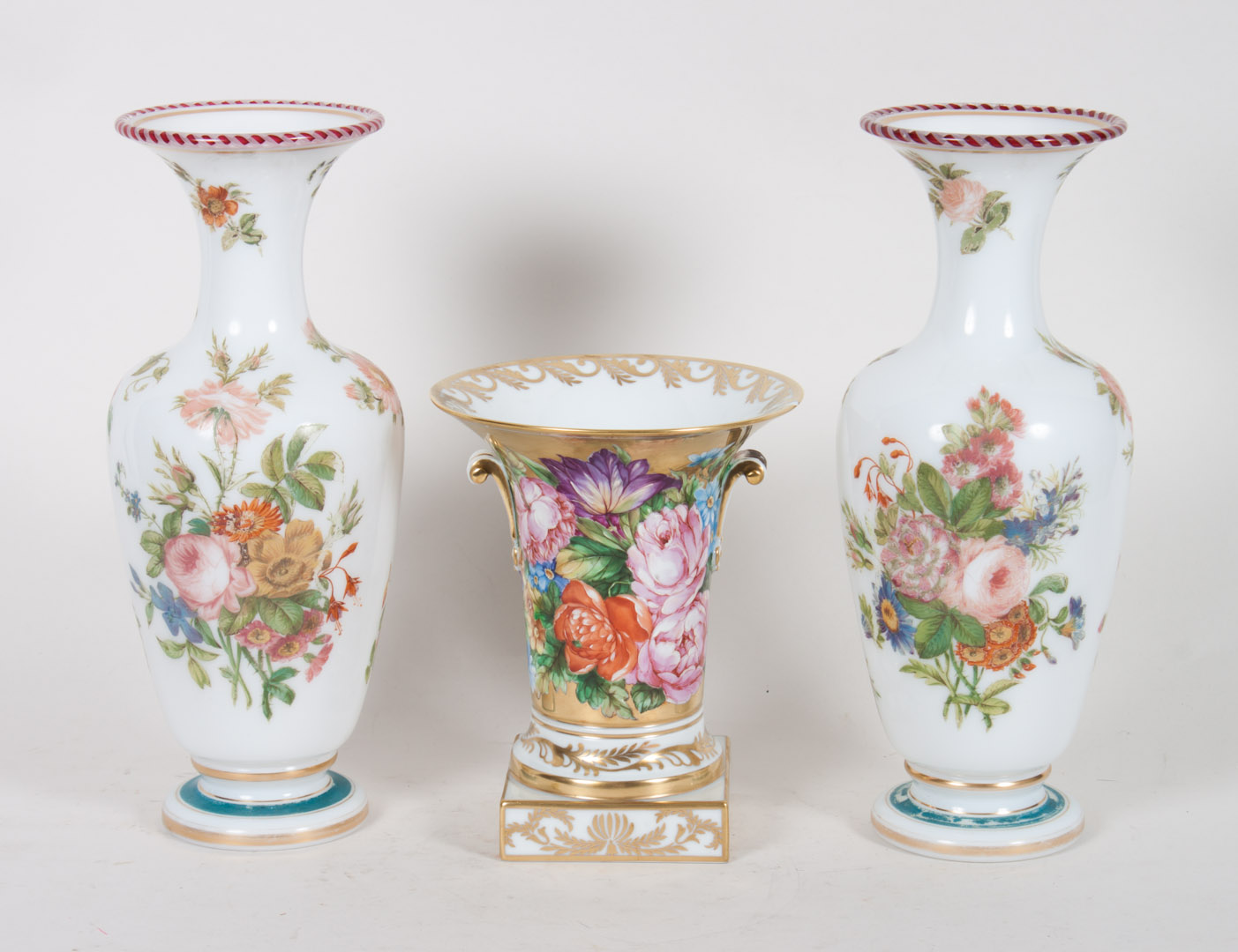 Appraisal: Pair of milk glass vases and a porcelain vase pair