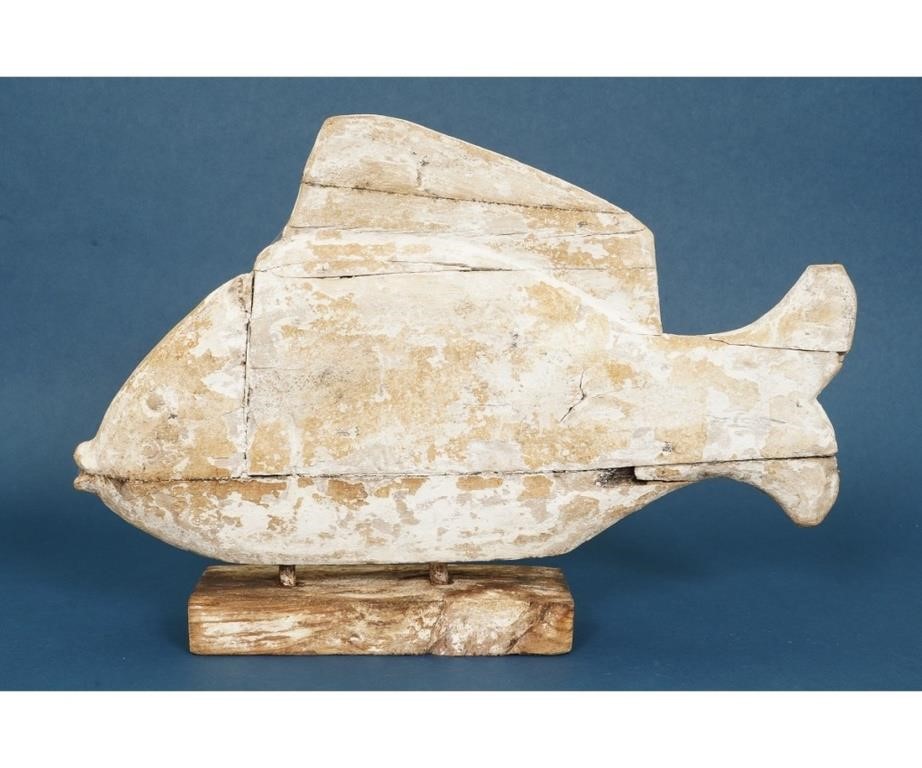 Appraisal: Folk art carved fish mounted on a square block probably