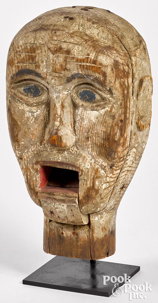 Appraisal: Carved and painted carnival head th c Carved and painted