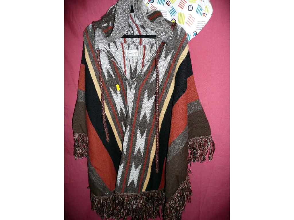 Appraisal: A Brookville American poncho with hood in browns and blacks