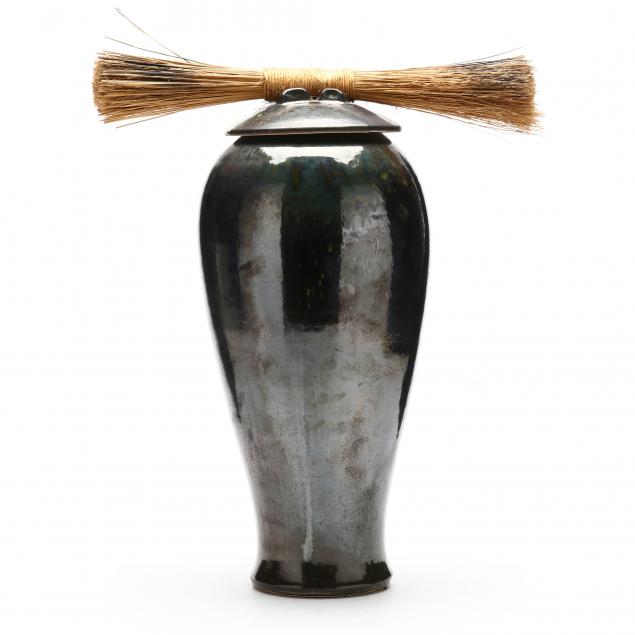 Appraisal: MARK HINES CONTEMPORARY TALL RAKU POTTERY URN Lidded urn with