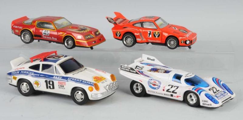 Appraisal: Lot of Battery-Op Race Car Toys Description Japanese Working Includes