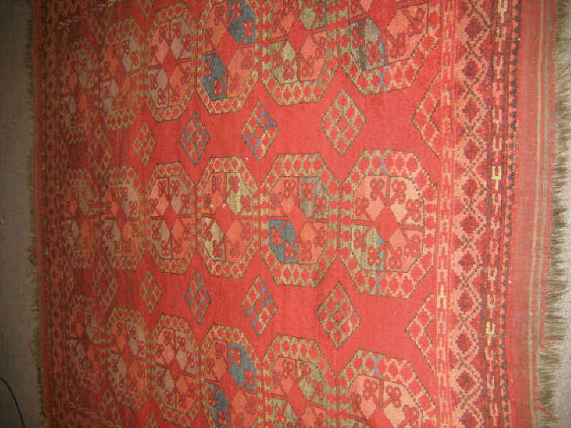 Appraisal: BESHIR AREA RUG The abrashed red field with three rows