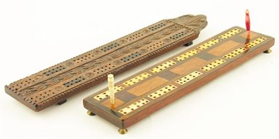 Appraisal: A George III dated carved walnut cribbage board inlaid sycamore