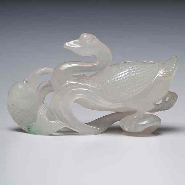 Appraisal: Chinese Jadeite Goose and Carp Figure Chinese A translucent jadeite