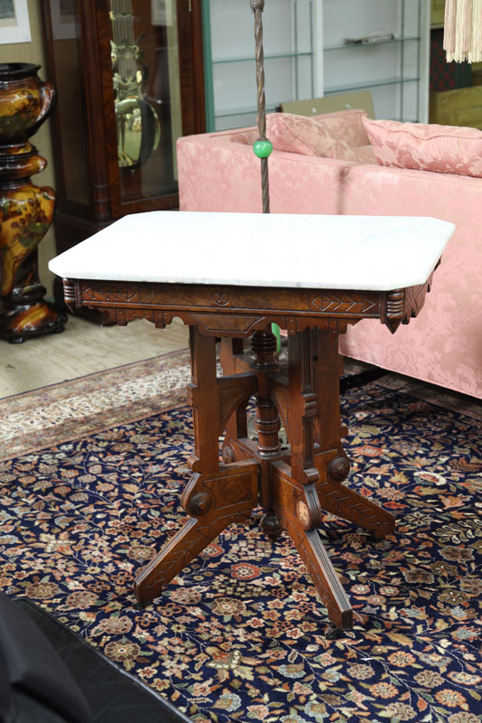 Appraisal: VICTORIAN MARBLE TOP TABLE White marble having canted corners on