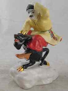 Appraisal: A Soviet Russian ceramic figure of a Cossack riding a