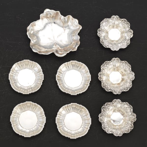 Appraisal: SEVEN INDIVIDUAL NUT DISHES AND A LEAF DISH Four Poole