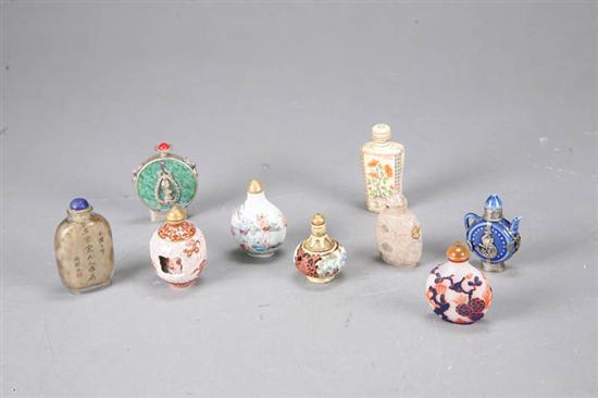 Appraisal: NINE SNUFF BOTTLES Three porcelain one Peking glass one reverse